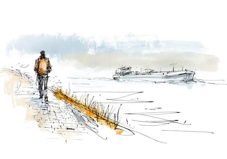 Man loopt over de dijk